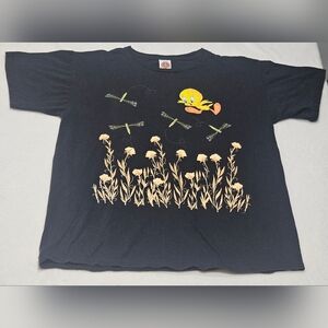 vintage 1990s Looney Tunes t-shirt featuring Tweety Bird and dragonflies